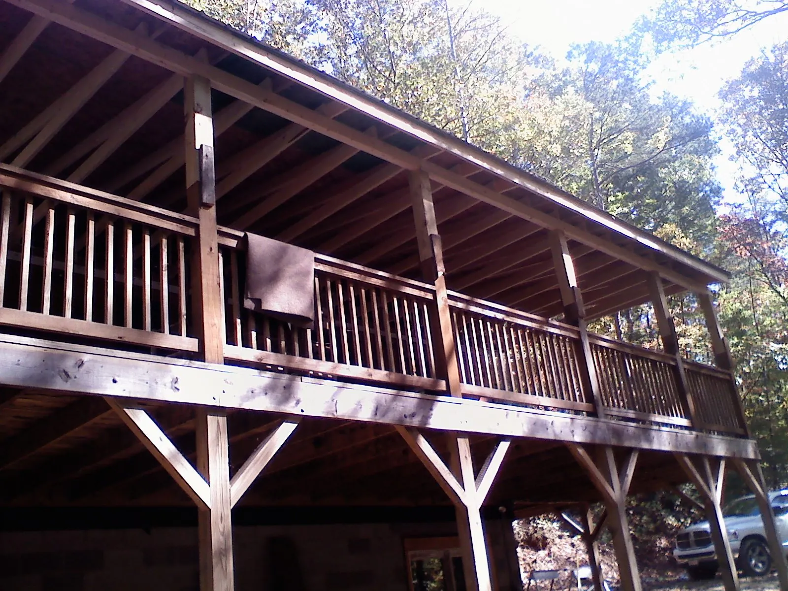 Timber framing under a new elevated porch and deck — Roof Leak Repair in Polk by Roofing Brothers